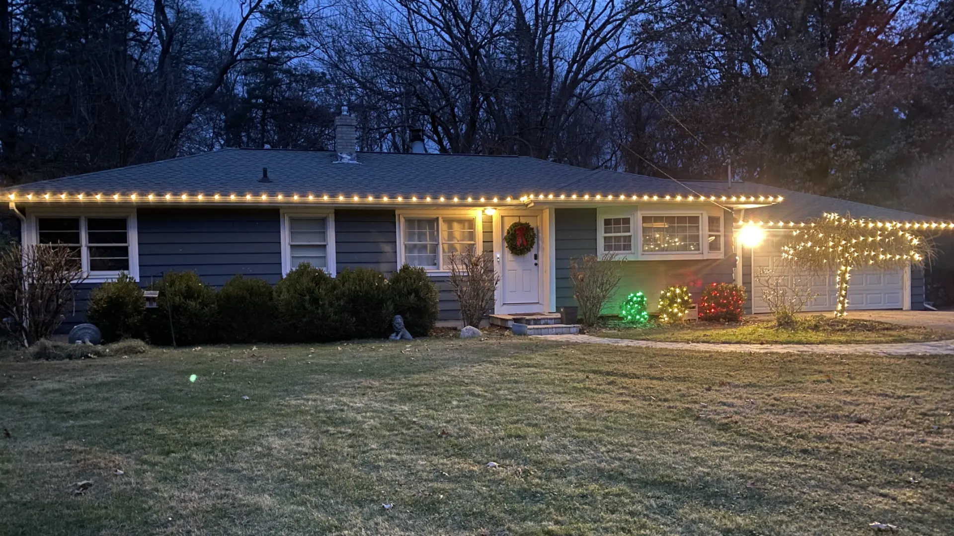 Holiday Lighting Should Be Planned Around Gutters, Trees, Snow, and Spring Lawn Recovery
