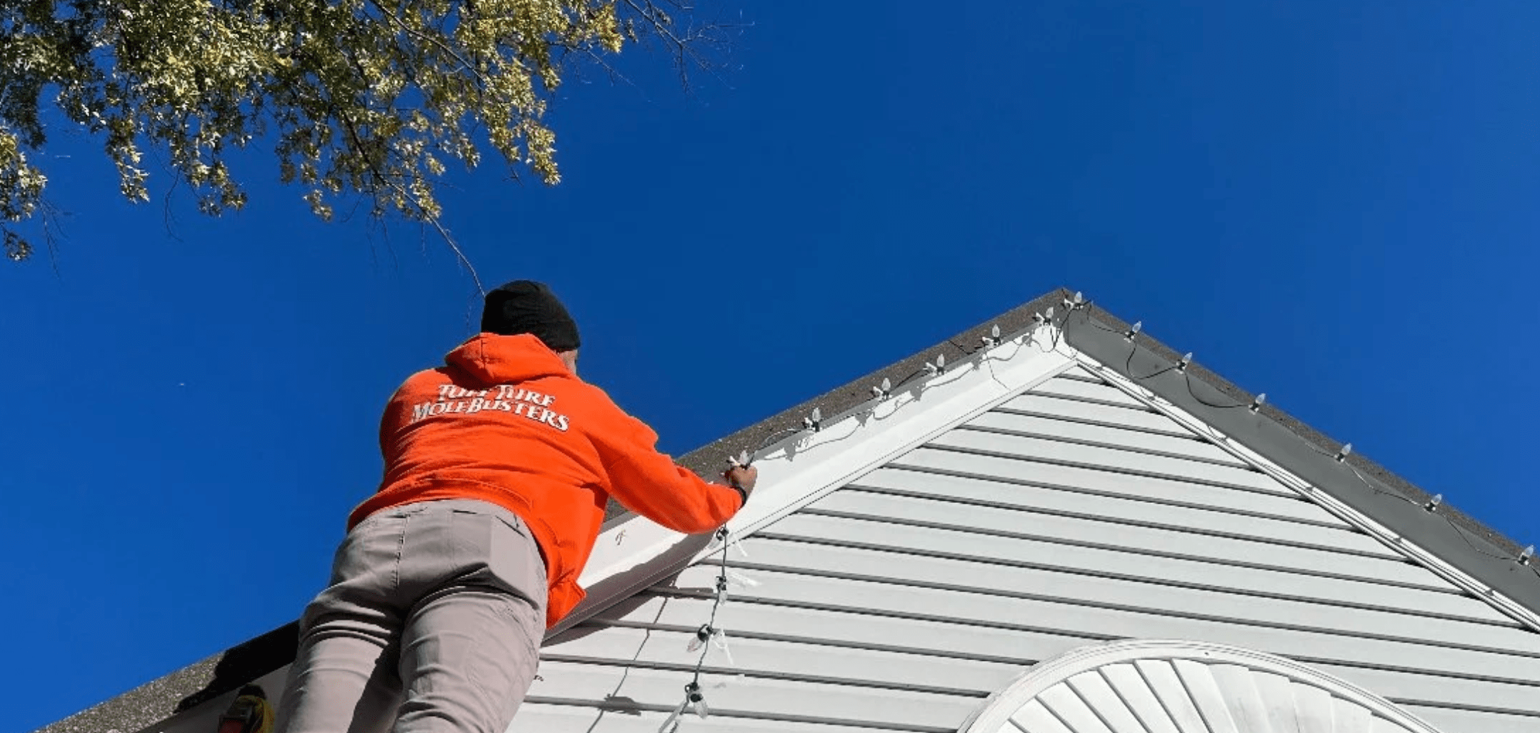 Tuff Turf holiday lighting installation crew